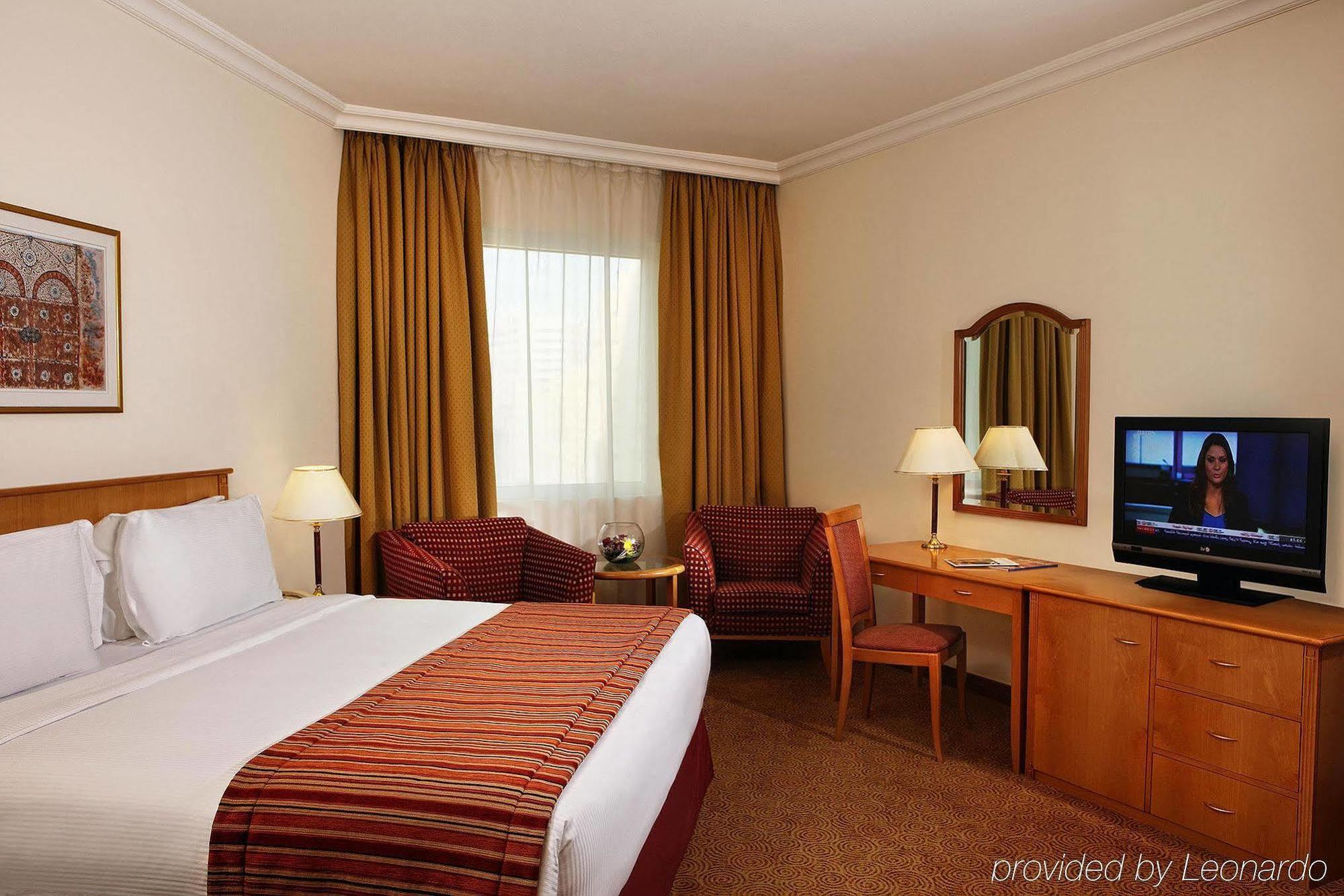 Swiss-Belhotel Sharjah Ruang foto